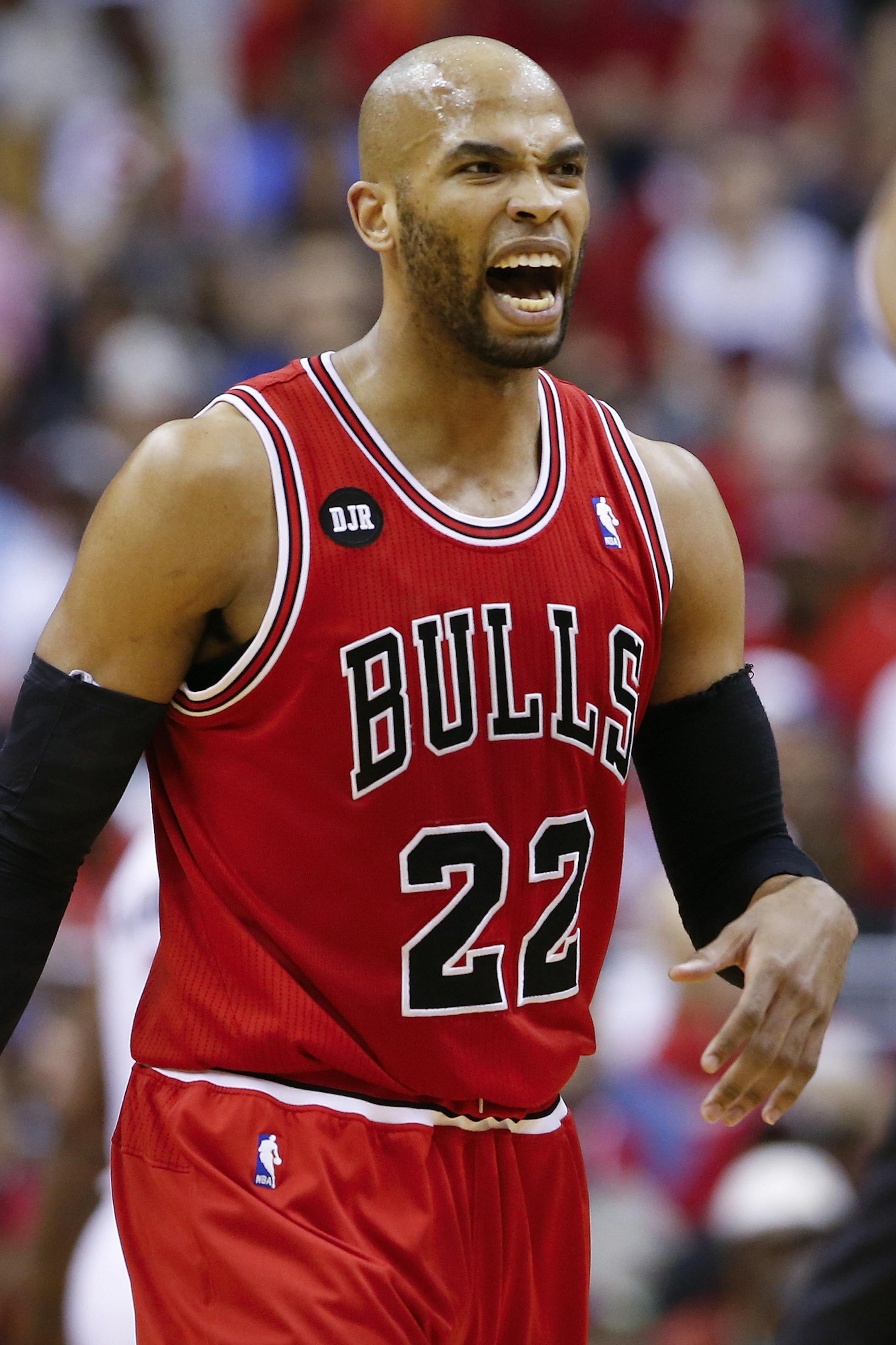 Chicago Bulls forward Taj Gibson (22) reacts to a call during the first half of game 4 of an opening-round NBA basketball playoff series against the Washington Wizards in Washington, Sunday, April 27, 2014. (AP Photo/Alex Brandon) ORG XMIT: NYOTK