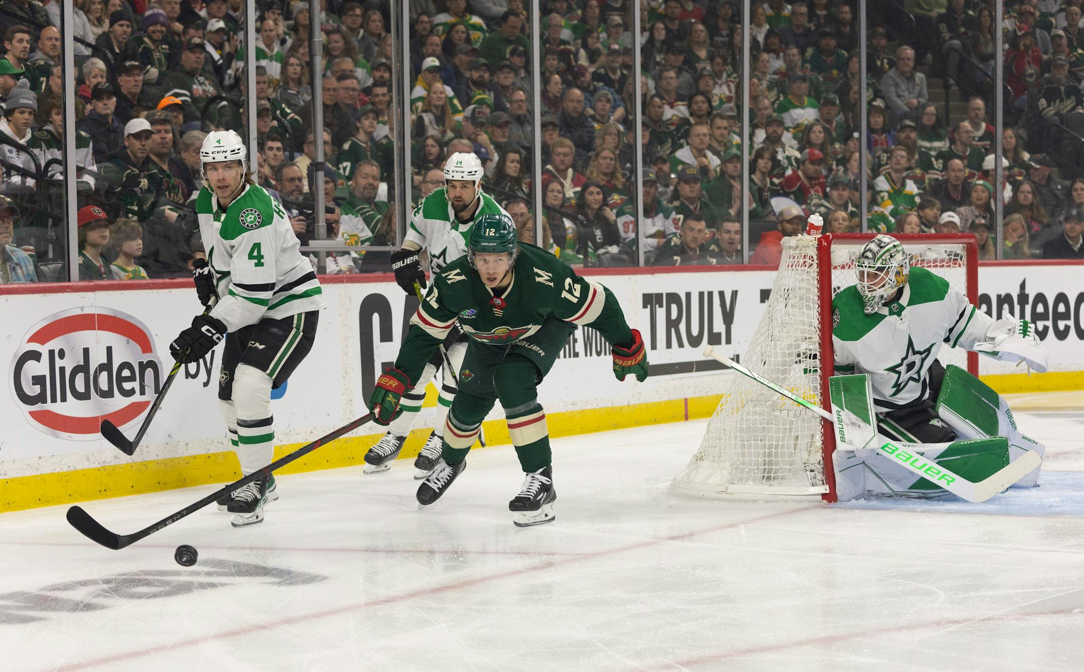 Minnesota Wild left wing Matt Boldy (12) looks for a teammate to pass to in the first period.