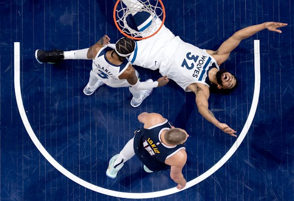 Karl Anthony Towns (32) of the Minnesota Timberwolves reacts after a jump ball call in the second half against the Denver Nuggets in Game 4 of the NBA