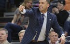 FILE - In this March 9, 21019, file photo, Minnesota Timberwolves interim head coach Ryan Saunders directs his players against the Washington Wizards 