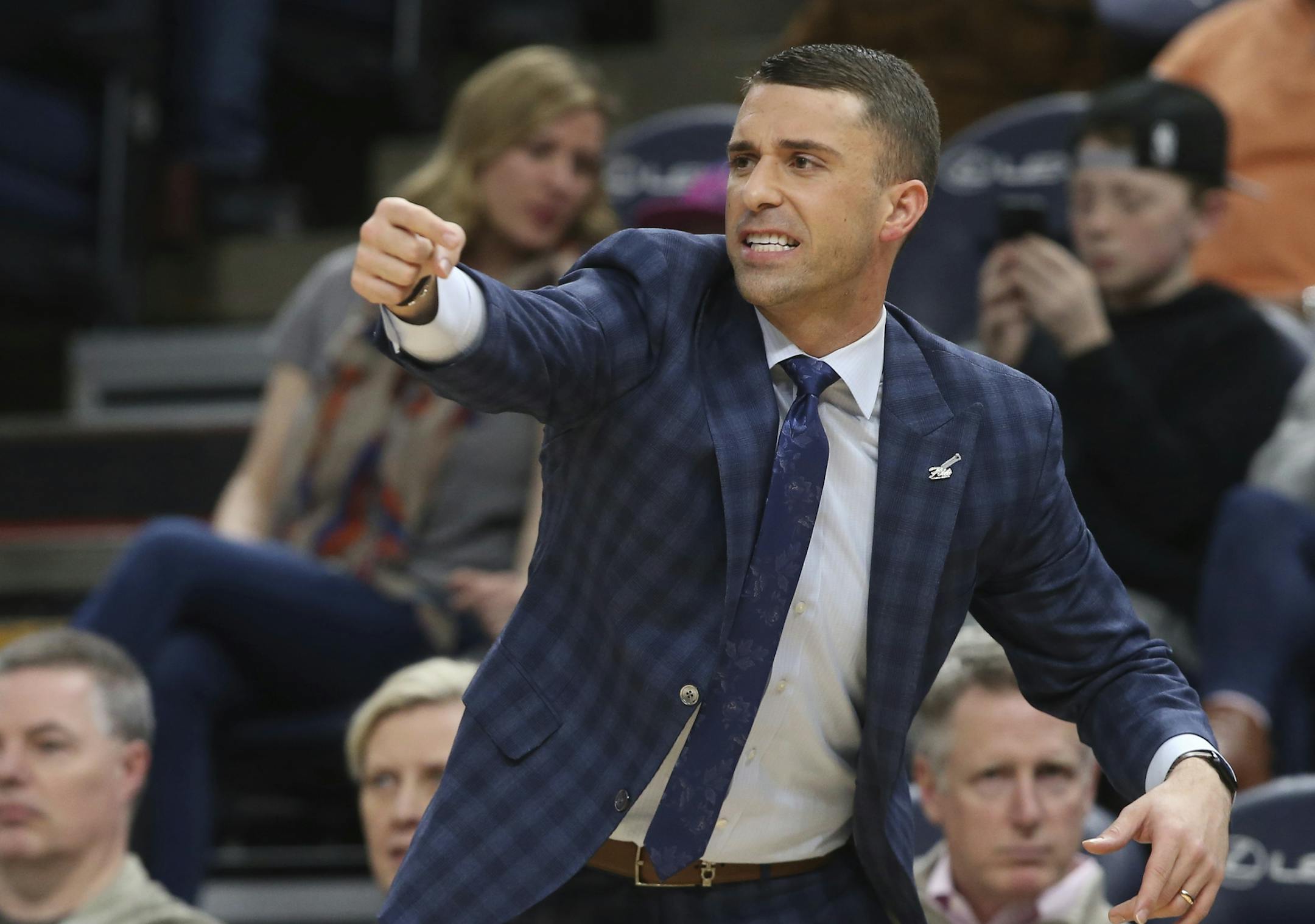 FILE - In this March 9, 21019, file photo, Minnesota Timberwolves interim head coach Ryan Saunders directs his players against the Washington Wizards in an NBA basketball game in Minneapolis. A person with knowledge of the process tells The Associated Press the Minnesota Timberwolves and Ryan Saunders are finalizing a contract to make the 33-year-old their permanent head coach. The person spoke to the AP on condition of anonymity Monday, May 20, 2019, because the Timberwolves had yet to announce