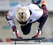 Barrett Martineau of Canada jumps on the skeleton during the men's race at the Skeleton World Cup in Altenberg, eastern Germany, Saturday, Nov. 28, 20