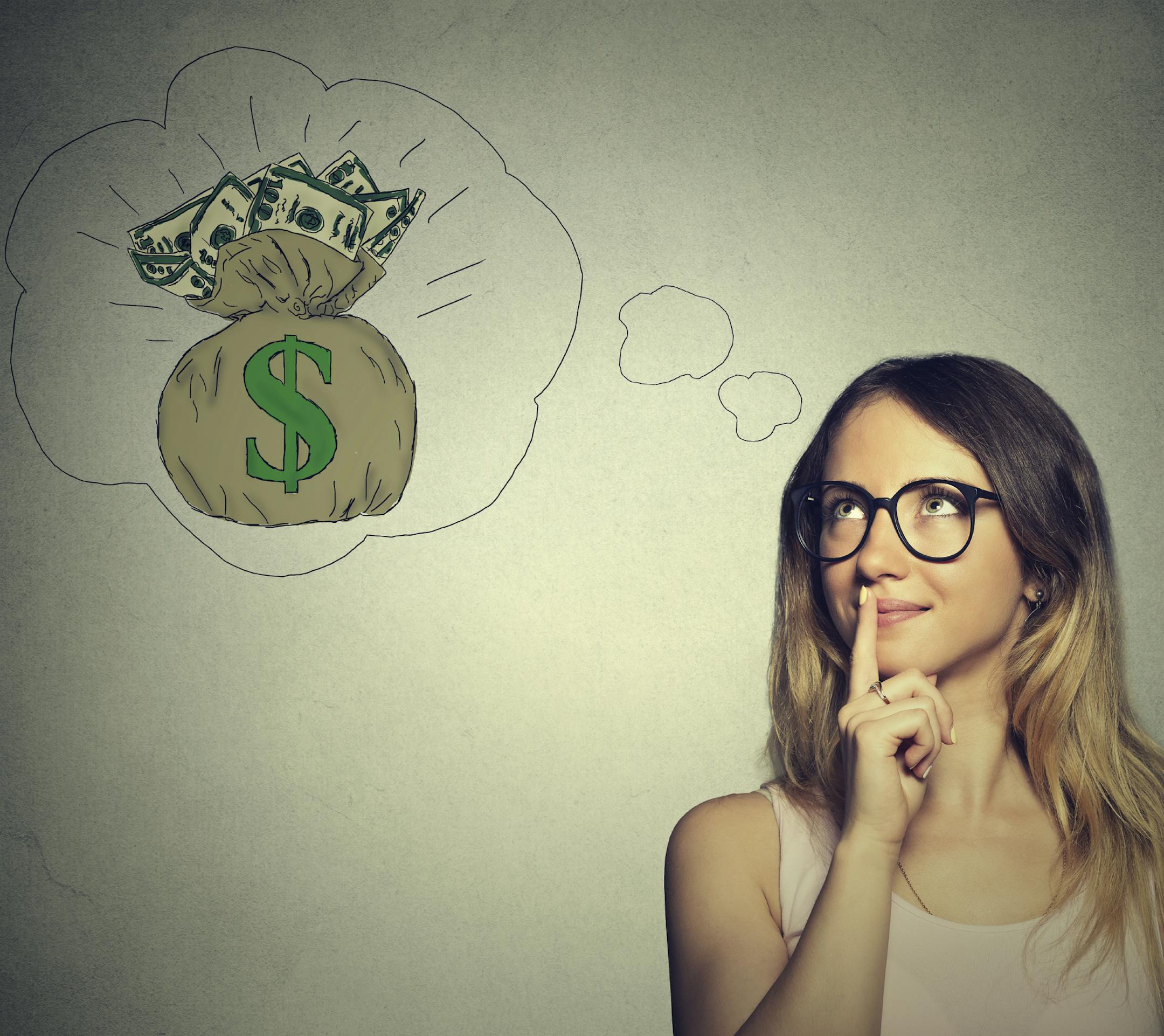 Woman dreaming of financial success