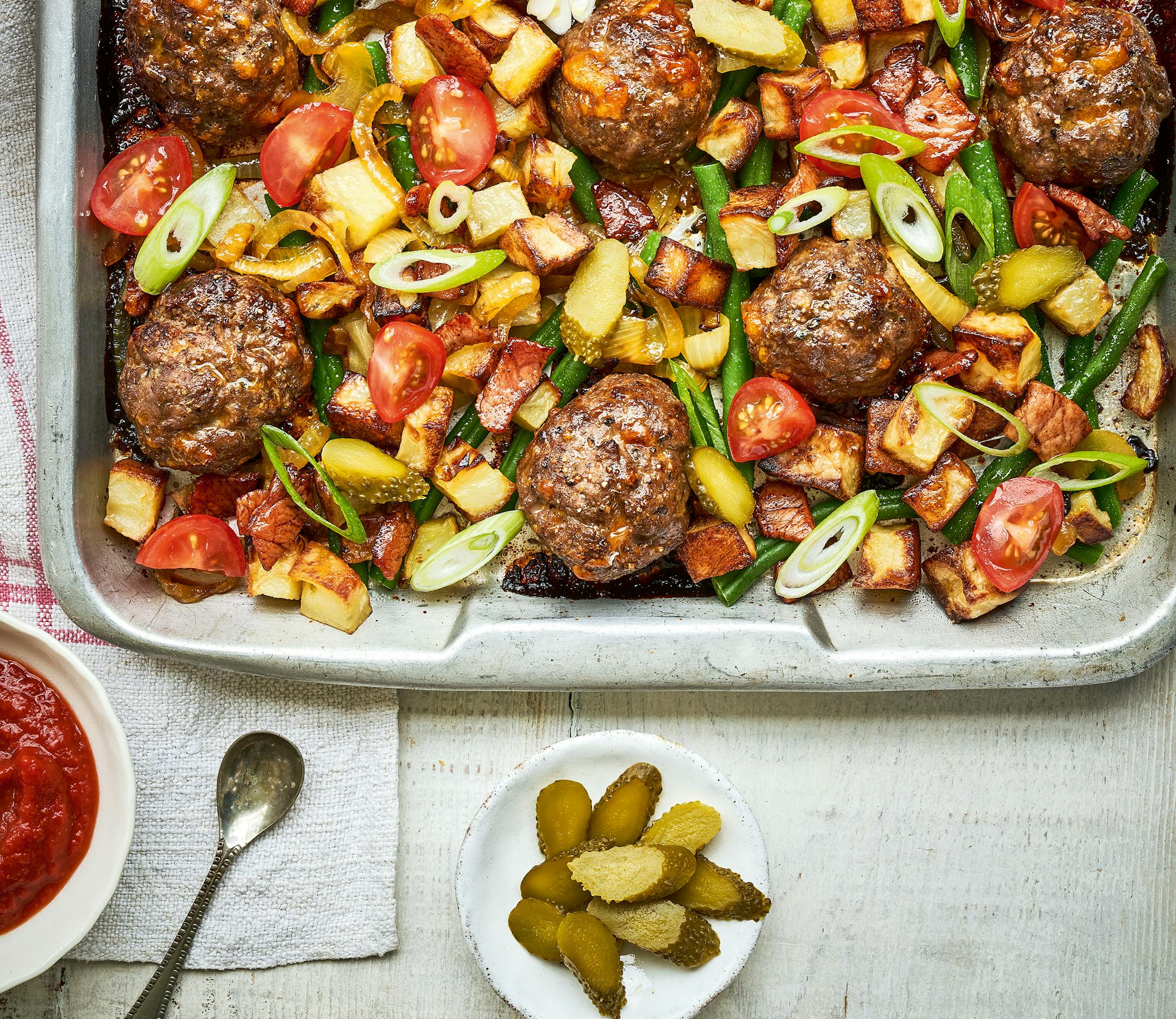 Cheeseburger Balls with Loaded Chippies from "The Slimming Foodie In One," by Pip Payne (Kyle Books, 2022). Credit: Chris Terry