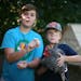 In October, Stefan and Wesley Remund showed off some eggs that Rachel the chicken, held by Wesley, laid in the family's back yard in Burnsville. The b