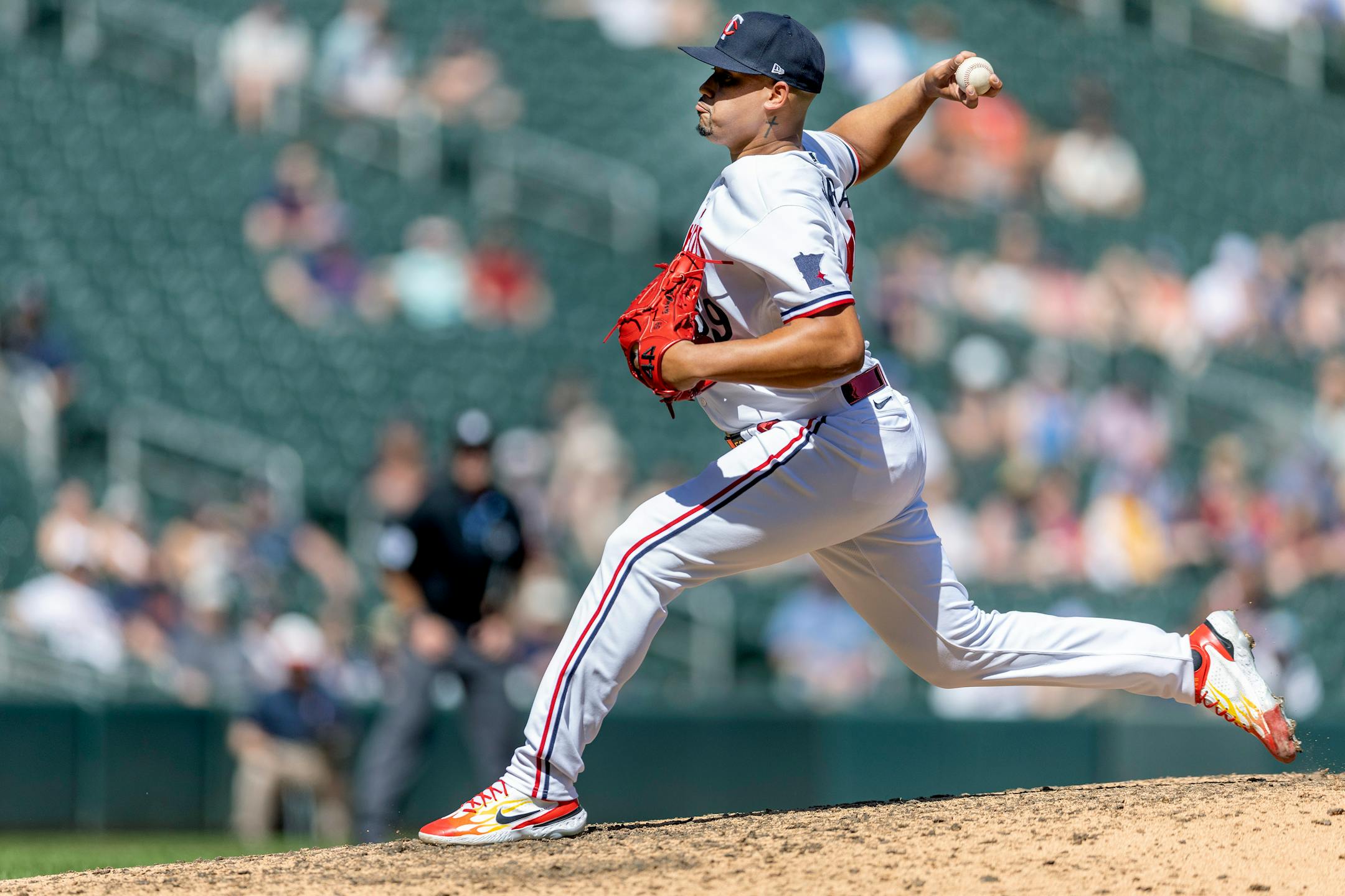 Minnesota Twins relief pitcher Jhoan Duran (59) takes to the mound during the top of the ninth inning.