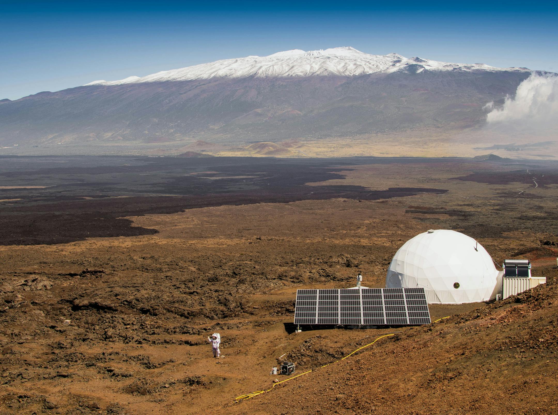 This March 10, 2015 photo provided by the University of Hawaii at Manoa HI-SEAS Human Factors Performance Study shows a dome in which six scientists lived an isolated existence to simulate life on a mission to Mars, on the bleak slopes of dormant volcano Mauna Loa near Hilo on the Big Island of Hawaii. The scientists who took part of a human performance study funded by NASA, stepped outside the dome at 8,000 feet elevation to feel fresh air on their skin Saturday, June 13, 2015, the first time t