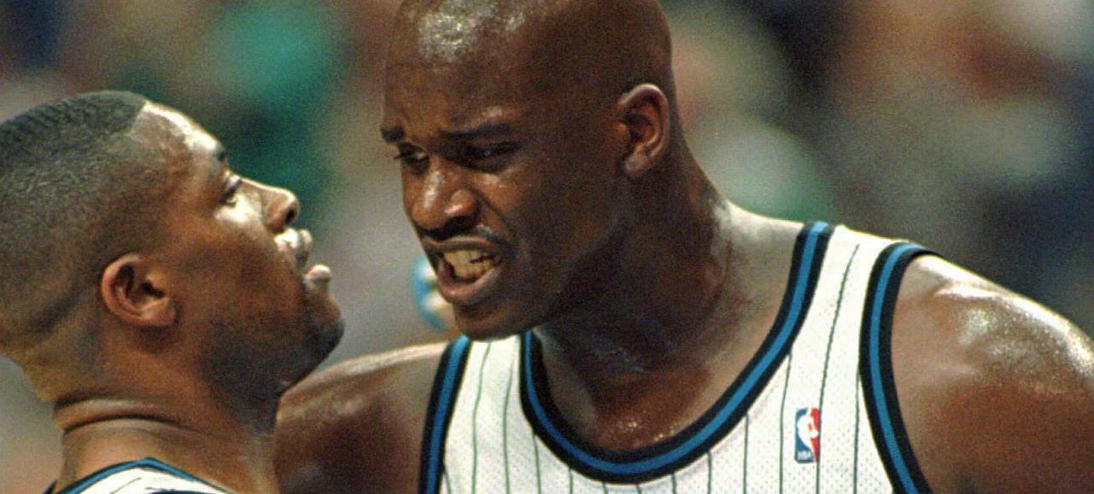 Orlando Magic center Shaquille O'Neal (32, right) tries to fire up guard Nick Anderson (25) during the second quarter of their Eastern Conference Quarterfinal game against the Detroit Pistons Friday night April 26, 1996 in Orlando. (AP Photo/Steve Simoneau) ORG XMIT: DOA104