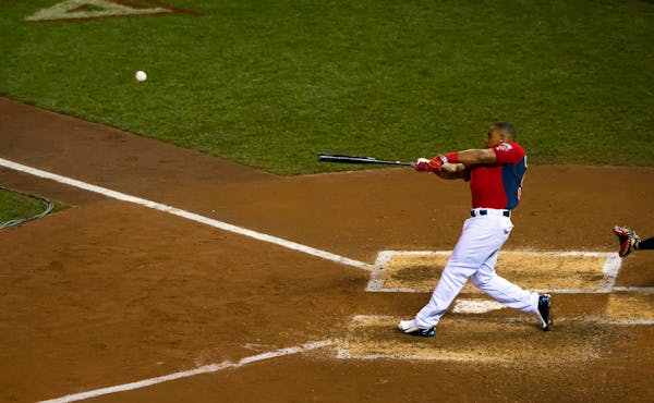 Yoenis Cespedes hits during the finals of the Home Run Derby. Cespedes won the event for the second straight year.