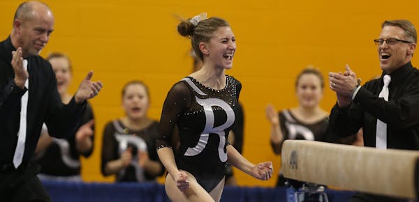 Roseville's Jessica Strecker celebrated after her performance on the balance beam during the Class 2A gymnastics state meet at the Sport Pavilion in M