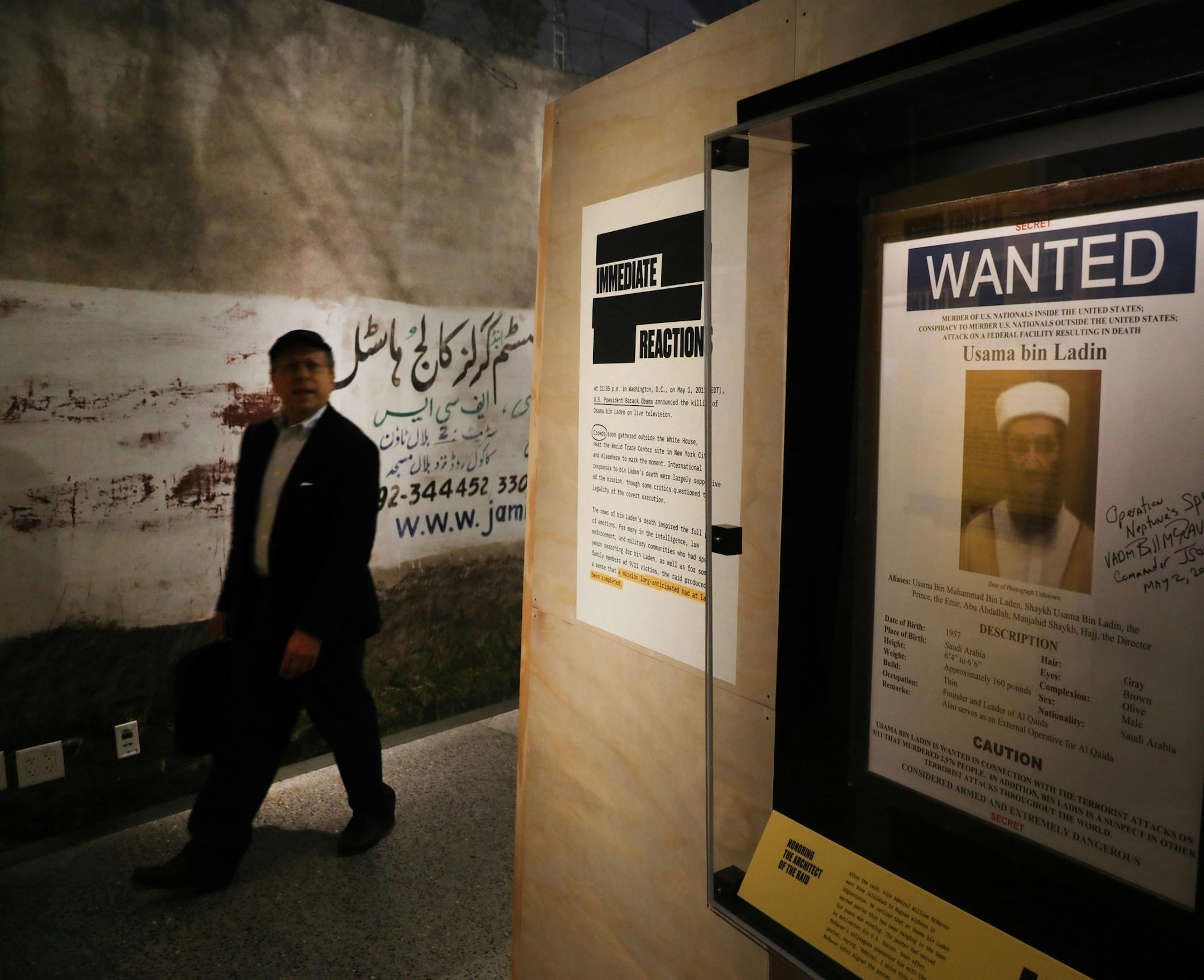 A poster and picture used to identify Osama Bin Laden is displayed at the new exhibition Revealed: The Hunt for Bin Laden at the 9/11 Memorial Museum on Nov.7, 2019 in New York City. The exhibition features declassified documents, testimony and objects to tell the story of the decade long hunt and capture of Osama Bin Laden, the terrorist mastermind behind the September 11 terror attacks. (Spencer Platt/Getty Images/TNS)
