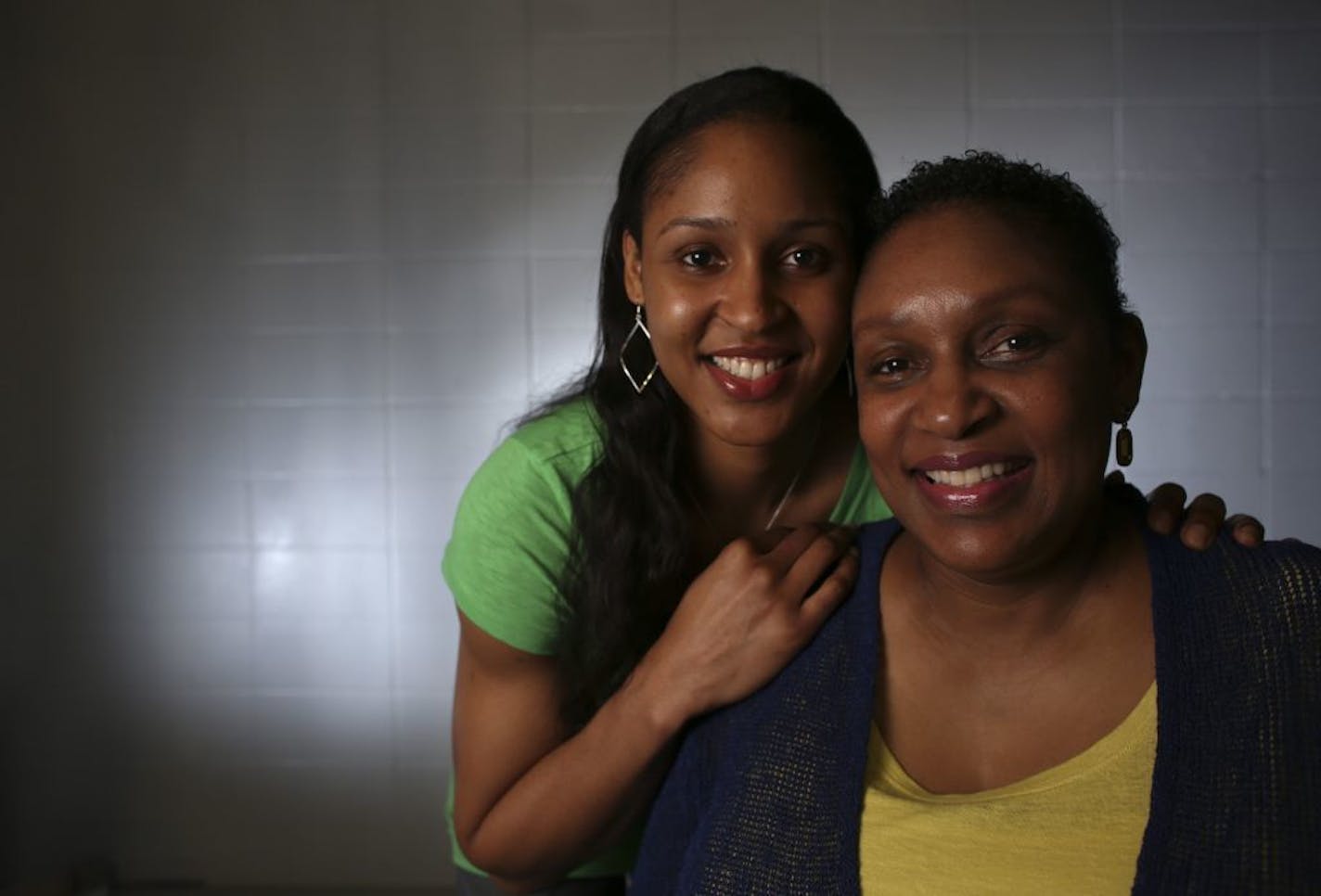 Minnesota Lynx basketball star Maya Moore, left, posed with her mother Kathryn Moore at Target Center