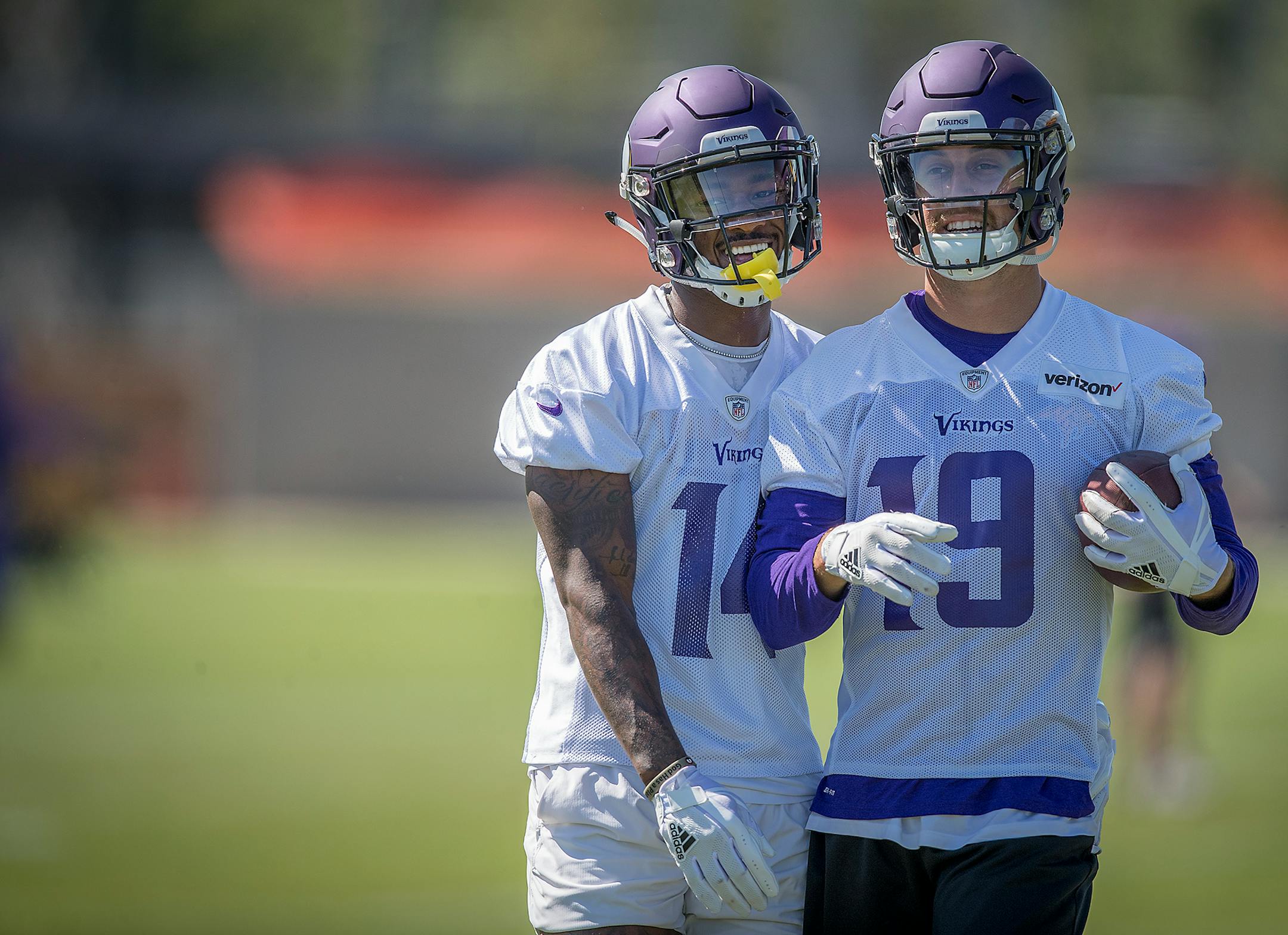 Vikings wide receiver Stefon Diggs, left, and Adam Thielen ran drill during a mandatory Vikings three-day minicamp in June.