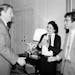 FILE - In this April 13, 1981, file photo, President Ronald Reagan greets UPI reporter Helen Thomas, center, and AP reporter Jim Gerstenzang, right, b