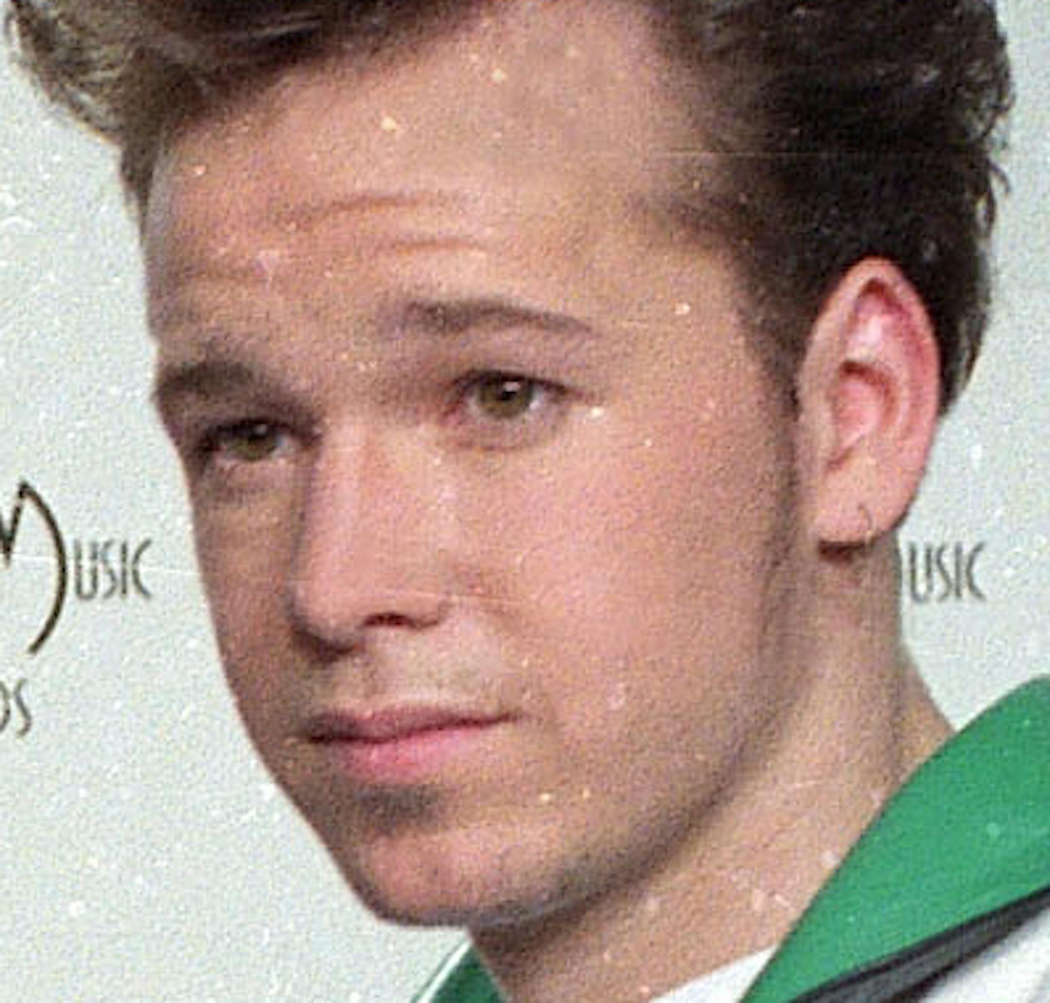 Four members of the teen pop group " New Kids on the Block" pose backstage at the American Music Awards in Los Angeles, Jan. 22, 1990, where they won in the category Favorite Pop Album. (AP Photo/Douglas C. Pizac) ORG XMIT: APHS211