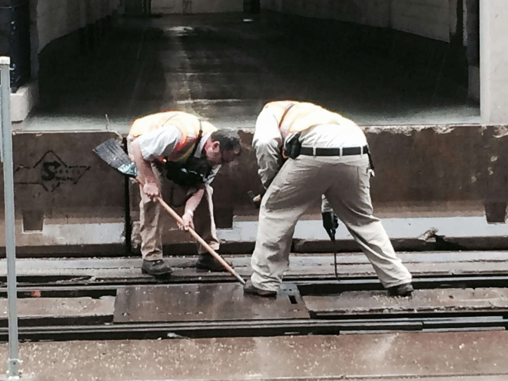 Workers tried to clear the tracks Wednesday afternoon.