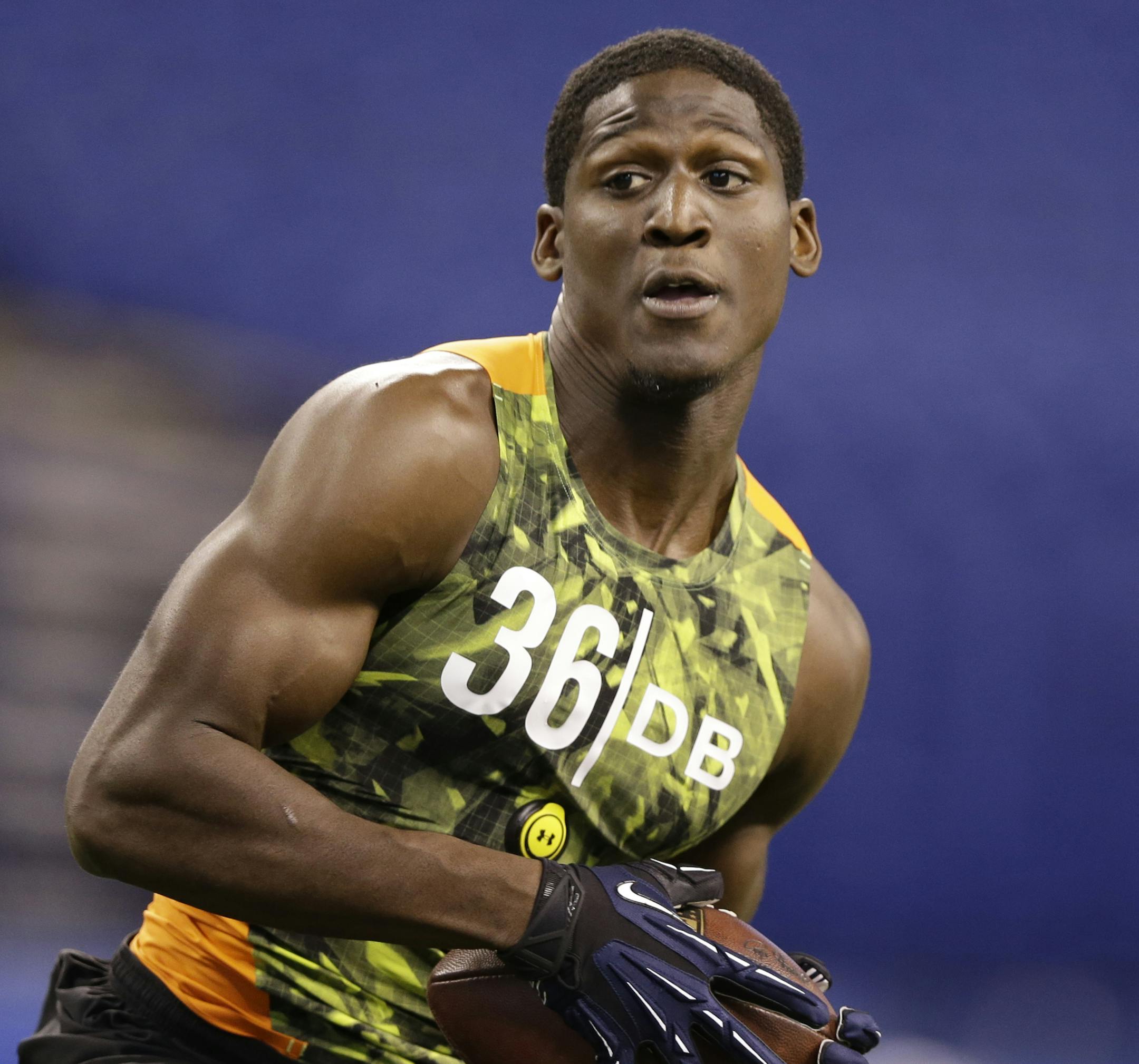 Florida State defensive back Xavier Rhodes runs a drill at the NFL football scouting combine in Indianapolis, Tuesday, Feb. 26, 2013. (AP Photo/Michael Conroy) ORG XMIT: NYOTK