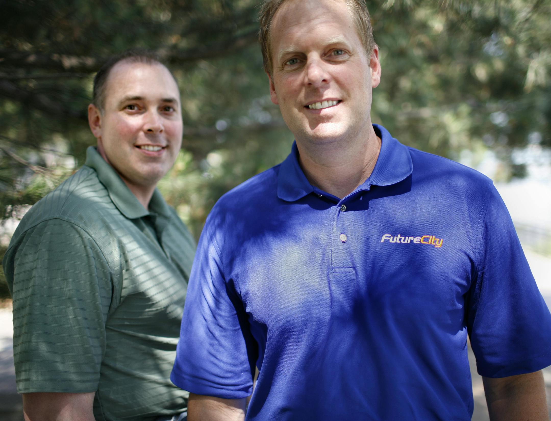 335497SAXO -- Nate Ursel is competing this year in the Lifetime Fitness Triathlon in honor of his brother, Alex Ursel, who is a veteran and collapsed in the race in 2010 and and as a result found out that he has a brain tumor. IN THIS PHOTO - Nate Ursel (in BLUE) with his brother Alex Ursel (in GREEN). - Photo: David Denney Star Tribune 7/11/2013 Minneapolis, MN
