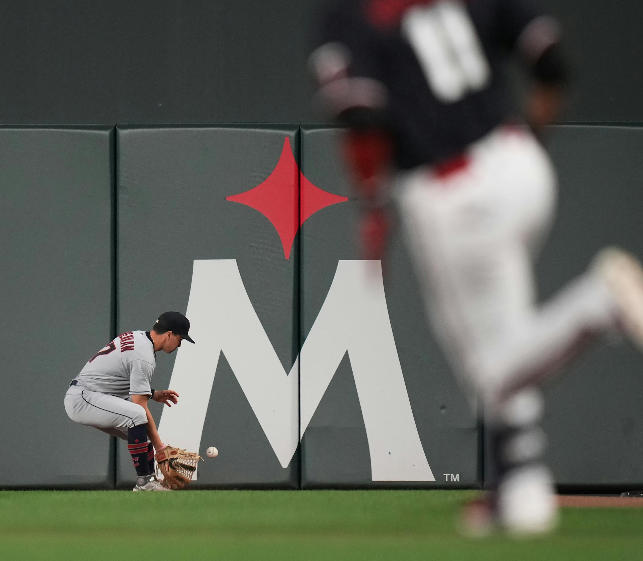 Minnesota Twins second baseman Jorge Polanco (11) doubles to right as Cleveland Guardians right fielder Will Brennan (17) fields the ball in Minneapolis, Minn., on Thursday, June 1, 2023.