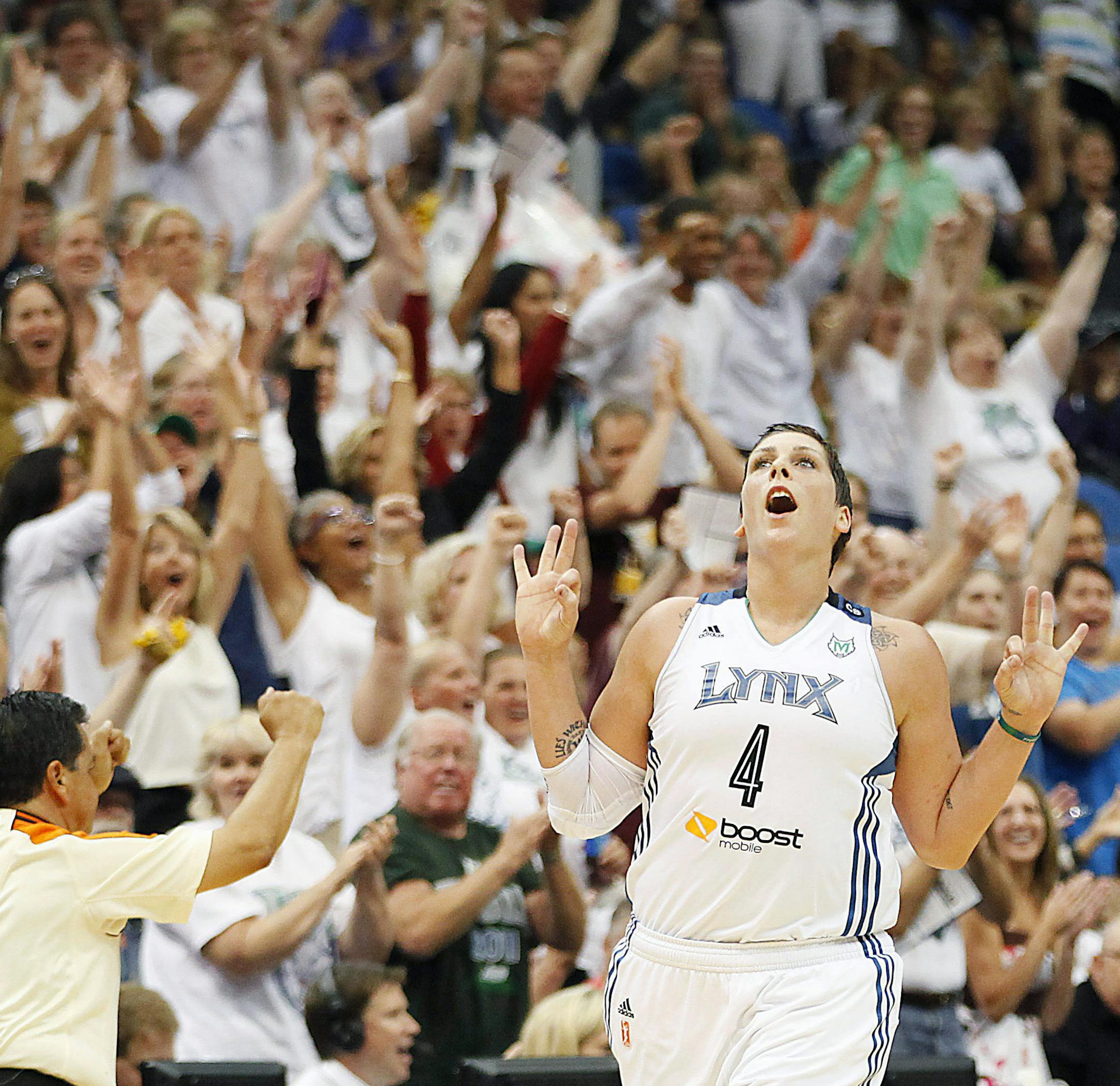 Minnesota Lynx forward Janel McCarville (4) celebrates after hitting a three-point basket against the Los Angeles Sparks in the final second of the second quarter of a WNBA basketball game on Wednesday, Sept. 4, 2013, in Minneapolis. (AP Photo/Stacy Bengs) ORG XMIT: MIN2013090923325991 ORG XMIT: MIN1309281452034549