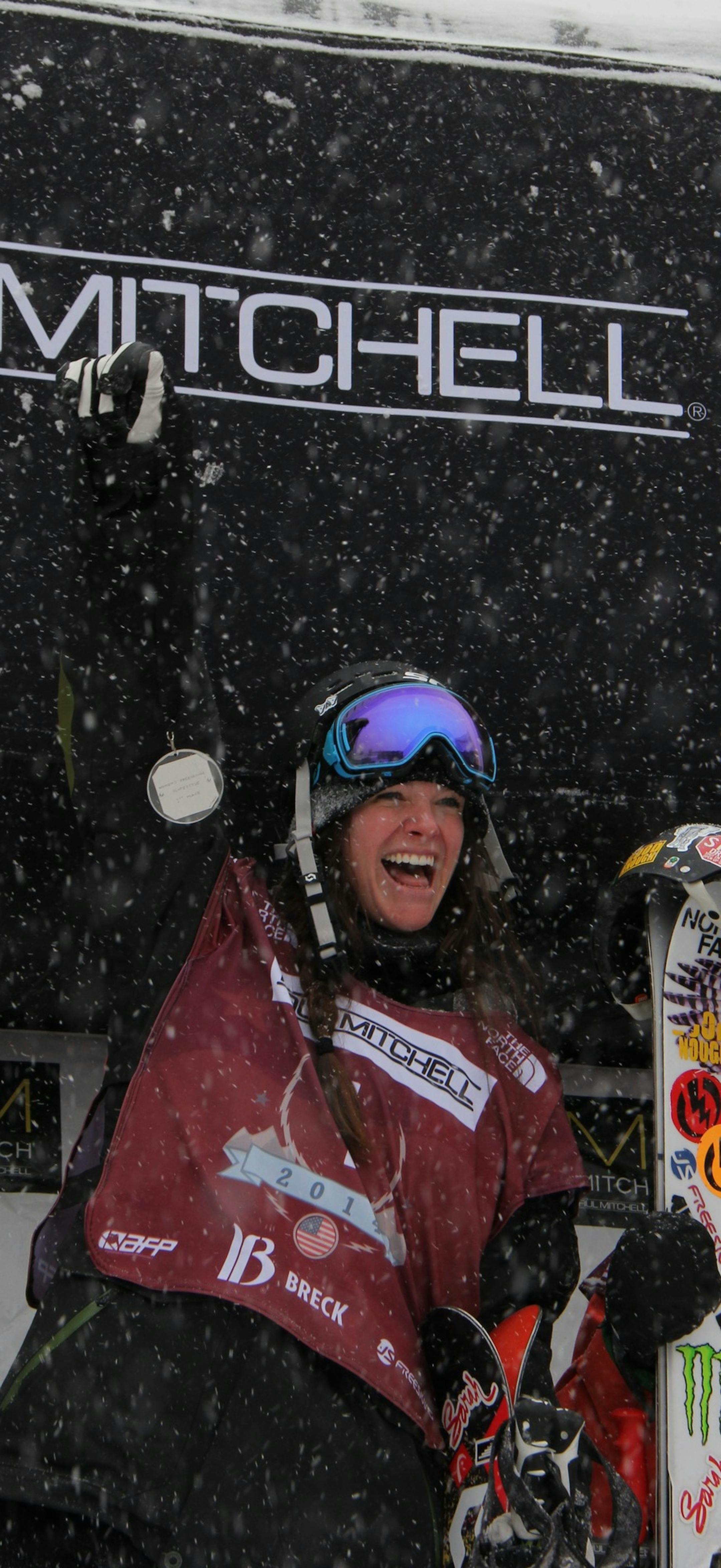 Keri Herman cheers after taking first place in the U.S. Grand Prix freestyle event at Breckenridge, Colo., Friday, Jan. 10, 2014. Event officials decided to forego the final round due to wind and heavy snow, results from Wednesday's qualifying round were used as finals. (AP Photo/Summit Daily News, Sebastian Foltz)