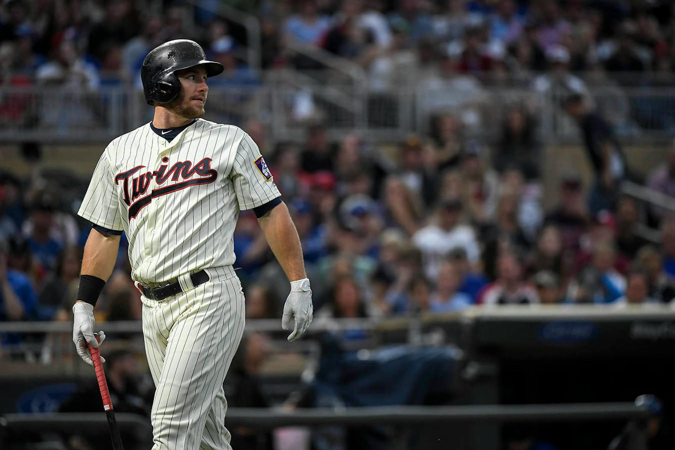 Minnesota Twins designated hitter Robbie Grossman (36) looked back after popping out to Toronto Blue Jays catcher Russell Martin (55) in the bottom of the third inning.