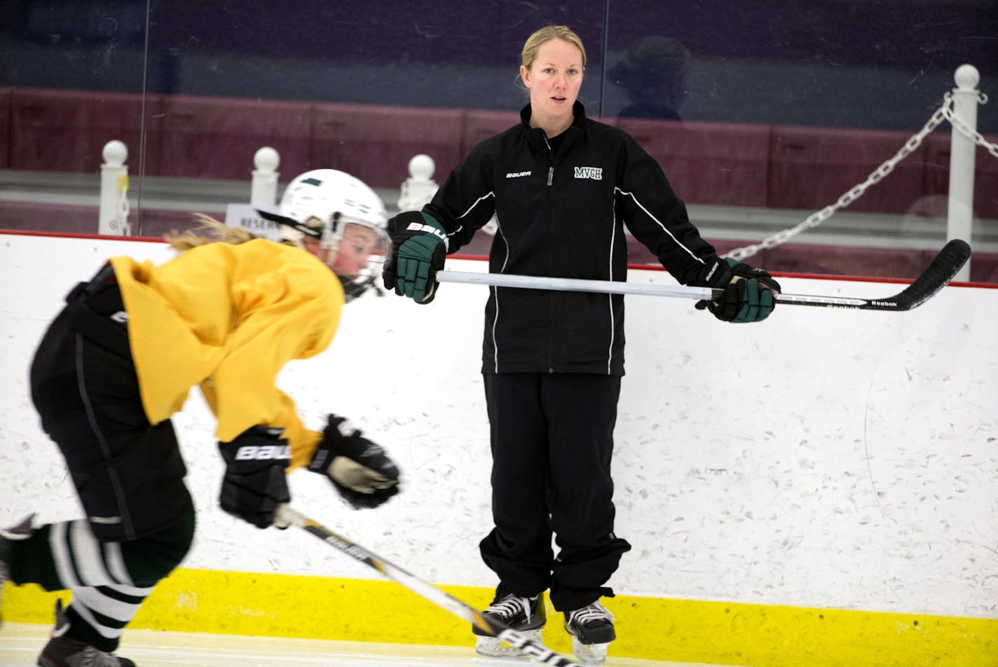 Christina Hanson, co-head coach of the Mounds View girls hockey team coaches during practice at Schwan Super Rink in Blaine on Wednesday, December 31, 2014. ] LEILA NAVIDI leila.navidi@startribune.com /