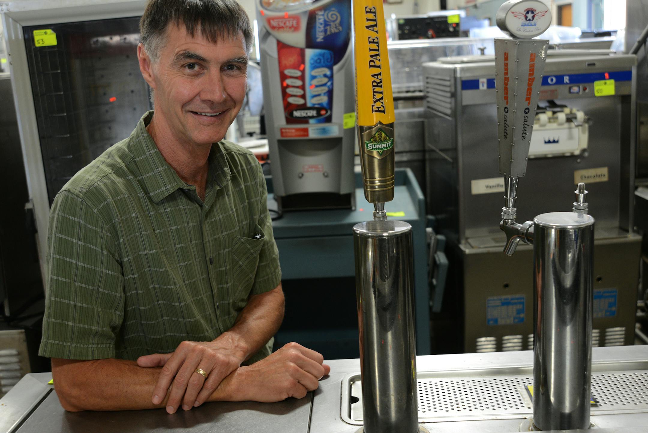 Greg Christian at Auction Masters in Maple Grove, Minn. on Thursday August 15, 2013 . Most of the stuff people buy is online from their web site. After buying people come to pick up at the auction site. These bar and kitchen items were in the storage area, waiting to be pickup.] Richard.Sennott@startribune.com Richard Sennott/Star Tribune Maple Grove, Minnesota Thursday 8/15/13) ** (cq)