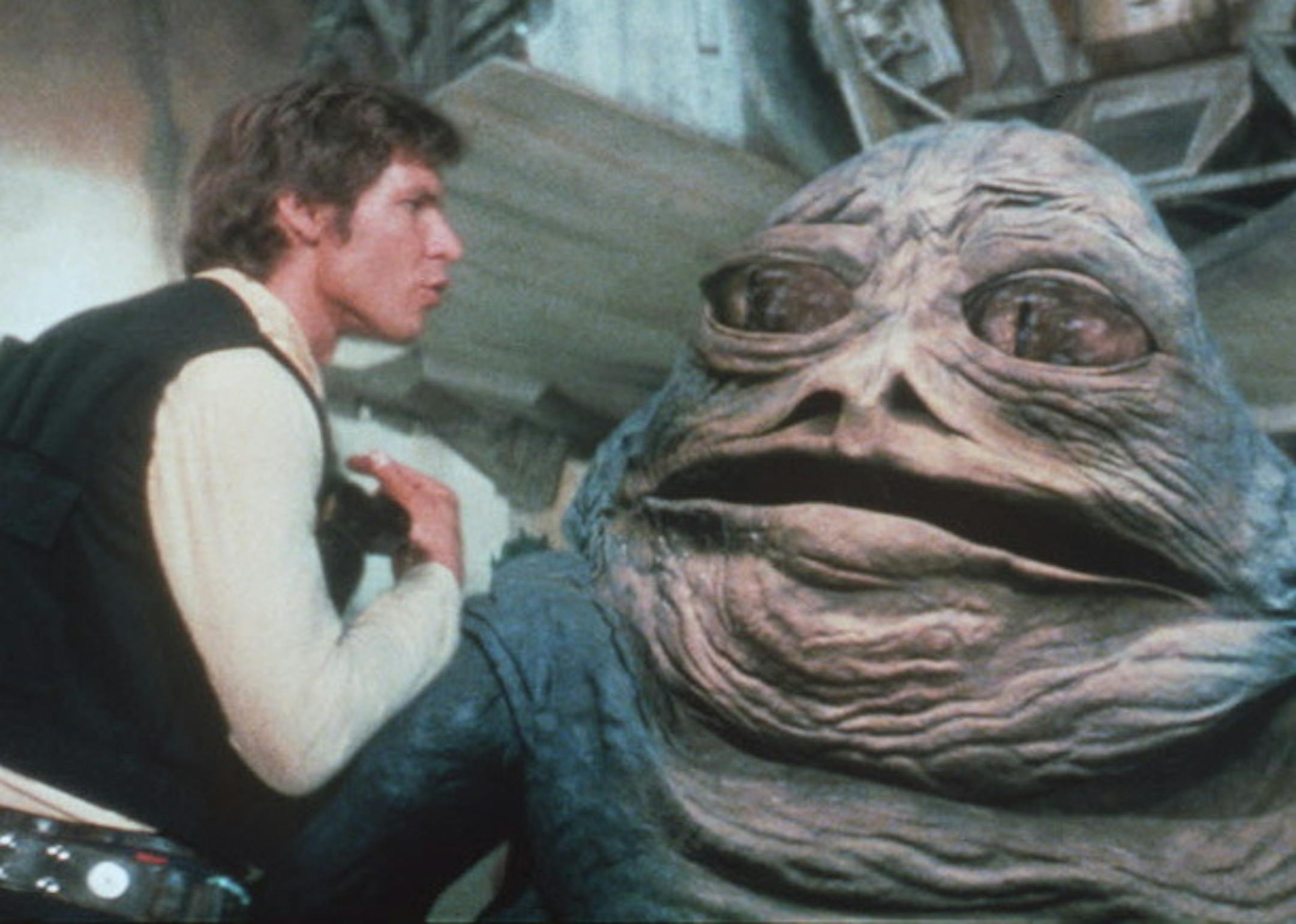 Harrison Ford (as Han Solo) talks to Jabba the Hut in a newly added scene to 1977 the movie "Star Wars."