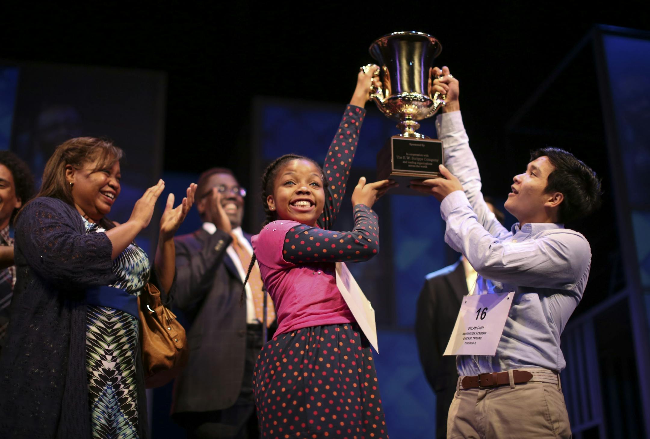Johannah Easley as Akeelah in a second act scene with Sean Phinney as Dylan and Aimee K. Bryant as her mother, Gail, left, and James A. Williams as her mentor, Dr. Larabee, rear, during rehearsal Sunday night.