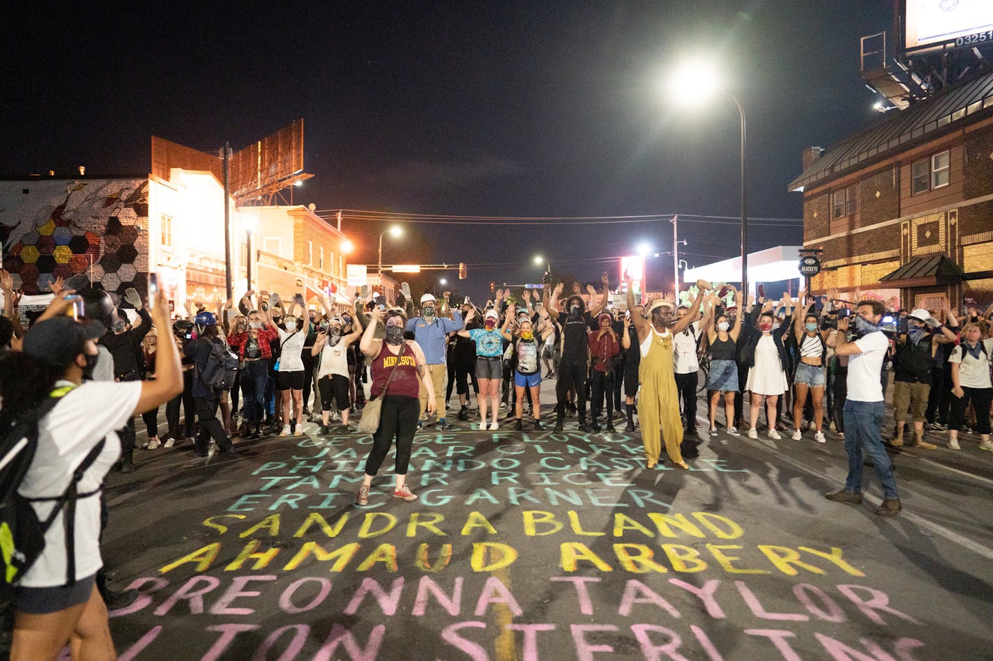 Protesters took up positions on barricades after the National Guard briefly arrived at the edge of the protest site. ] MARK VANCLEAVE - Several hundred peaceful protesters remained at the George Floyd memorial at Cup Foods as curfew took effect Monday, June 1, 2020 in Minneapolis.