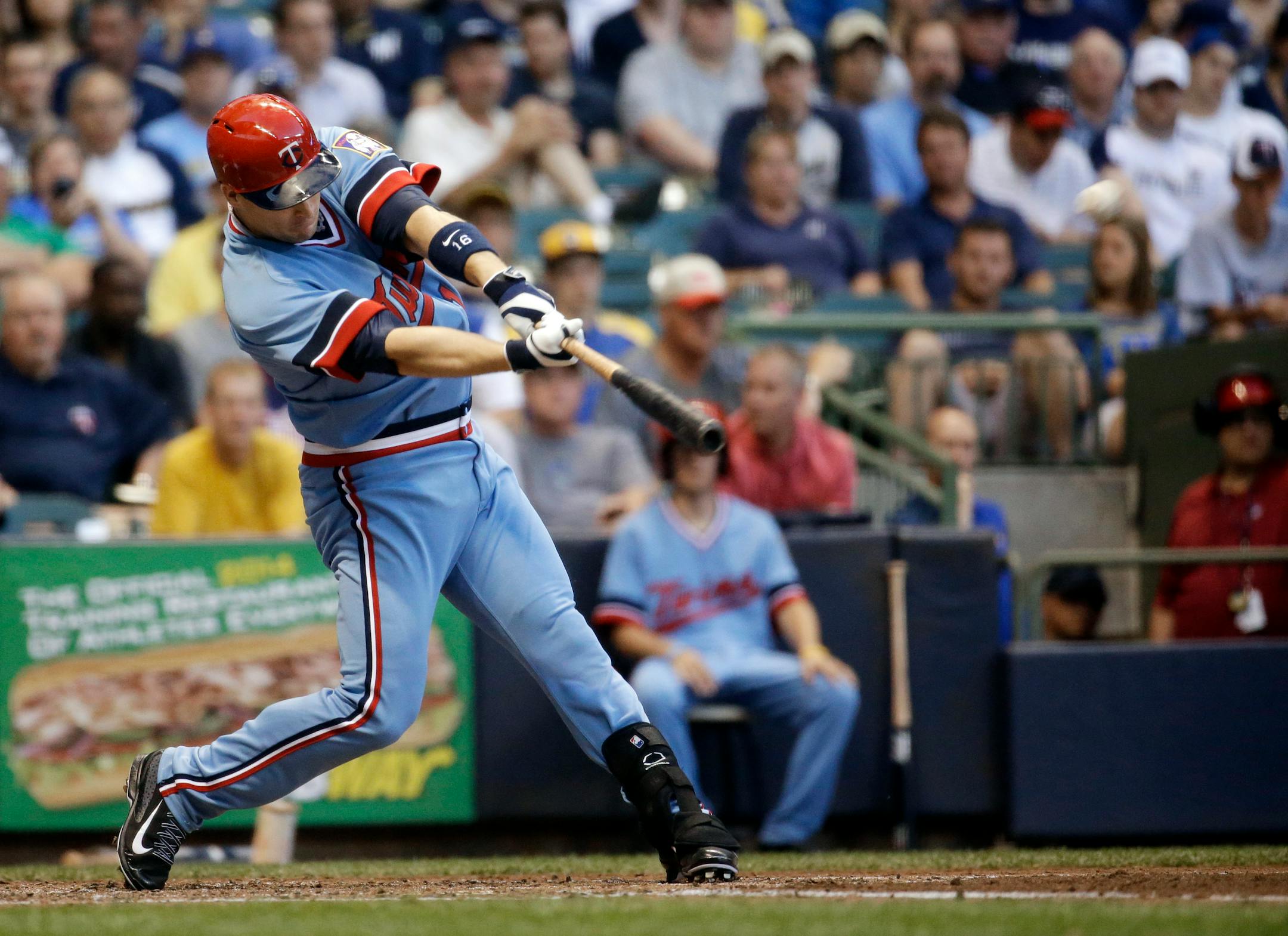 Minnesota Twins' Josh Willingham hits a three-run home run during the third inning of a baseball game against the Milwaukee Brewers on Tuesday, June 3, 2014, in Milwaukee. (AP Photo/Morry Gash)