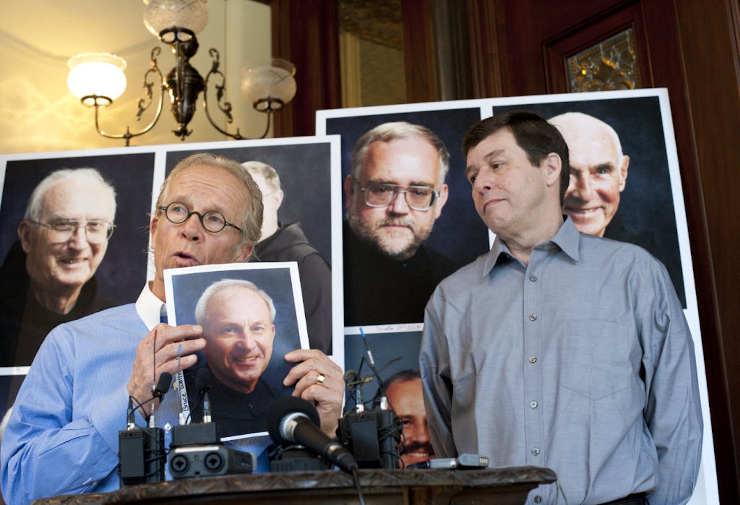 Attorney Jeff Anderson, left, announced a settlement of lawsuits against St. John's Preparatory School of Collegeville, Minn. Jerry McCarthy, right, saidhe was abused by one of the monks.