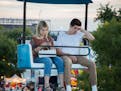 Burnsville High School students Chloe Atkinson and Jake Shepley gained internet fame when a photographer caught them in an unguarded moment at the Min