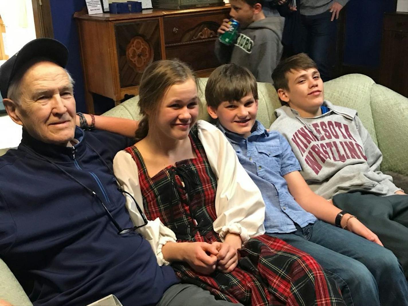 Patrick F. Petit with three of his grandchildren, from left, Caelan, Kieran and Charlie.