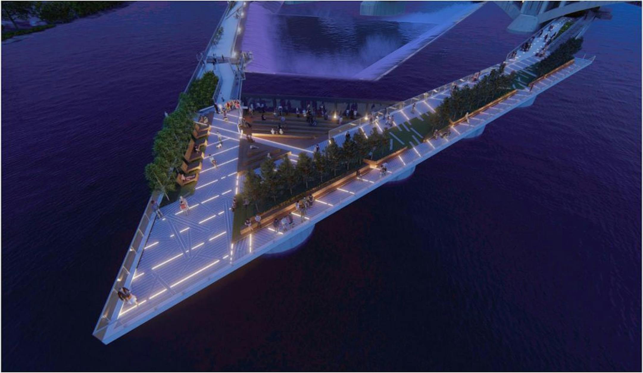 The tip of the structure at night.