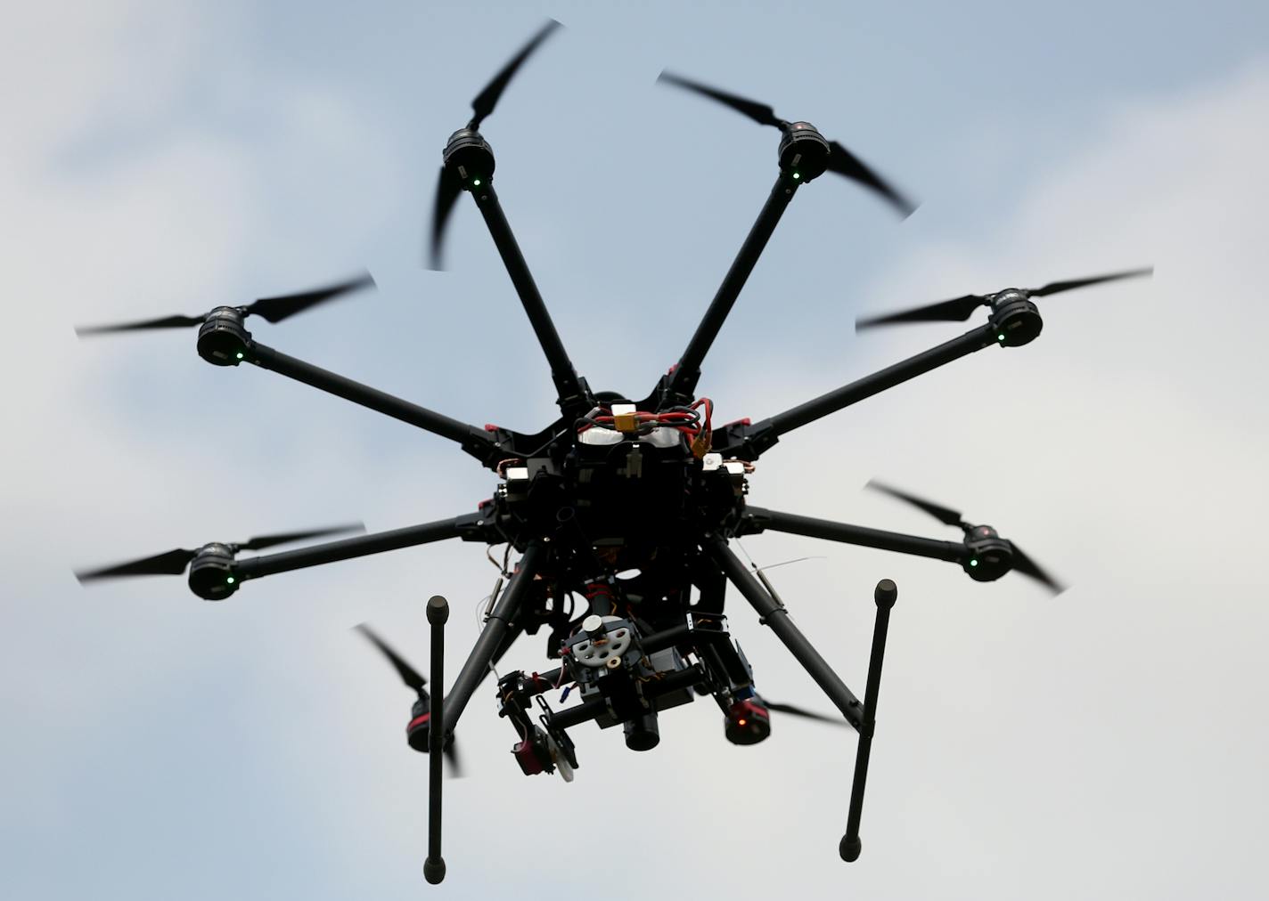 This DJIS-1000 hovered as to landed after a test flight. ] (KYNDELL HARKNESS/STAR TRIBUNE) kyndell.harkness@startribune.com University of Minnesota researchers are testing how well drones, or unmanned aircraft systems, detect insects like soybean aphids and potato beetles. in Rosemount, Min., Thursday, July 7, 2015.