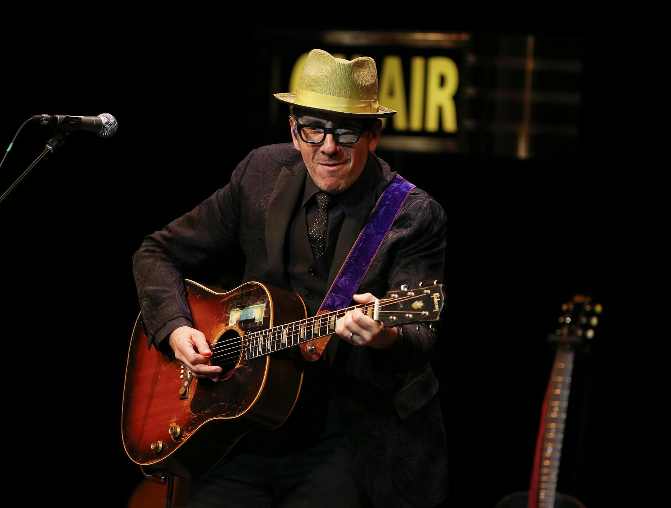 Elvis Costello, early in his set at the O'Shaughnessy Auditorium in St. Paul Monday night. It was his first Twin Cities appearance as a solo act. ] JEFF WHEELER ‚Ä¢ jeff.wheeler@startribune.com Elvis Costello began a solo tour of the U.S. with a show at O'Shaughnessy Auditorium on the campus of St Catherine University in St. Paul Monday night, June 9, 2014.