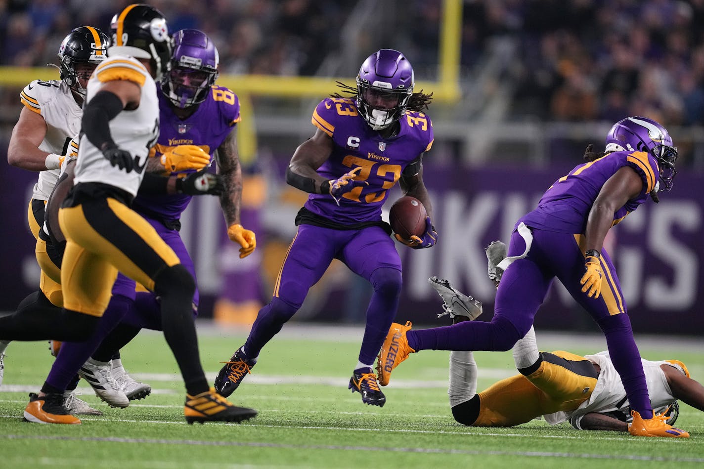 Minnesota Vikings running back Dalvin Cook (33) found a seam as he rushed the ball in the third quarter of an NFL game between the Minnesota Vikings and the Pittsburgh Steelers Thursday, Dec. 9, 2021 at U.S. Bank Stadium in Minneapolis. ] ANTHONY SOUFFLE • anthony.souffle@startribune.com