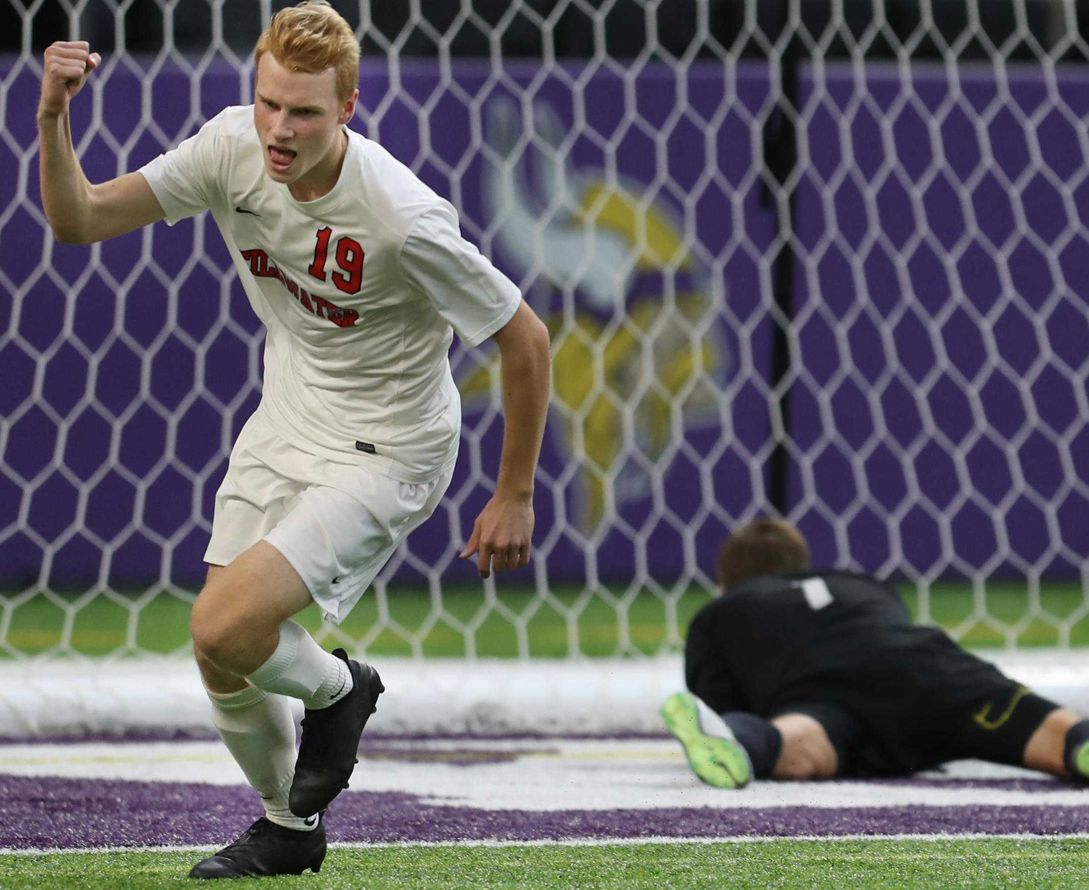 Colman Farrington(19) celebrates Stillwater's first goal.]In the Class 2A soccer championship game between Wayzata and Stillwater at US Bank Stadium.Richard Tsong-Taatarii/rtsong-taatarii@startribune.com