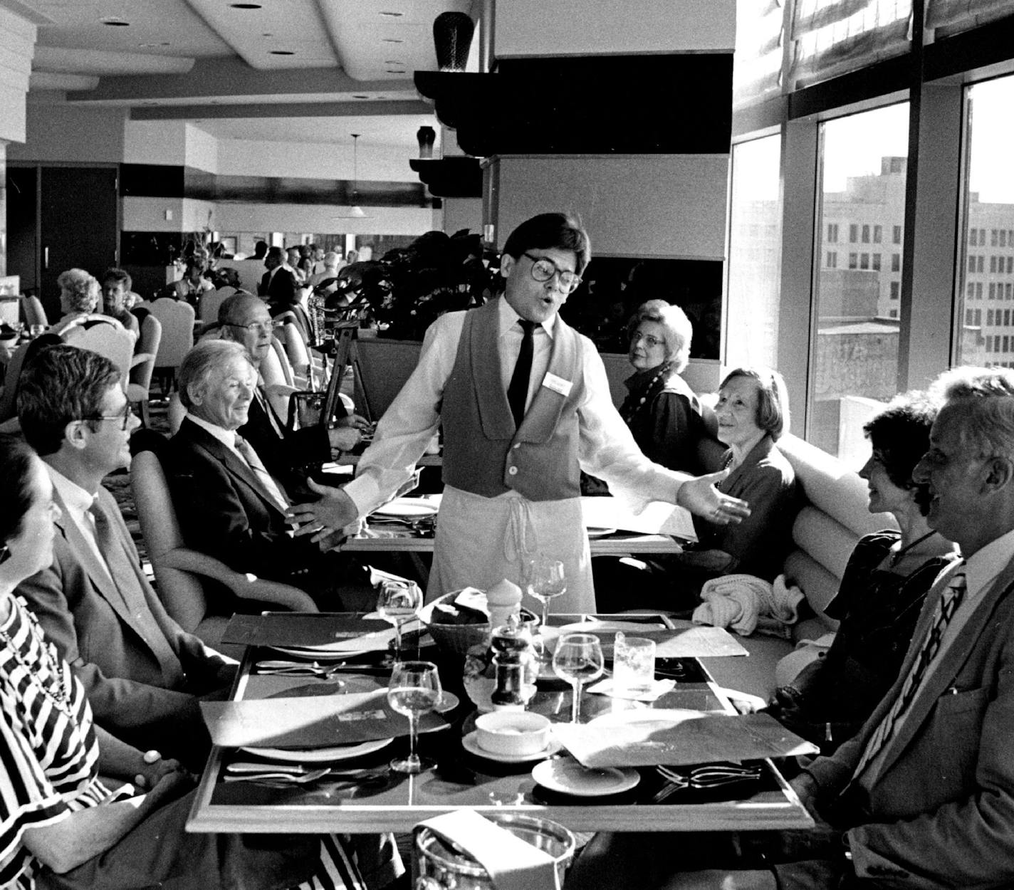 Bravo Gustino's The dinner only Italian restaurant in the Amfac Hotel, 30 S. 7th St. (349-4000), offers views of the city at sunset, plus food, music and charm. The staff - part-timers with the Minnesota Opera and other theater and music companies - periodically stops pushing the pasta around the room to let fly with cascades of tunes by Rossini, Puccini, Verdi, Sondheim. In between oeuvres, the ivory piano pours forth Beethoven, Chopin and the like. Grilled salmon with pesto, veal, sweetbreads,