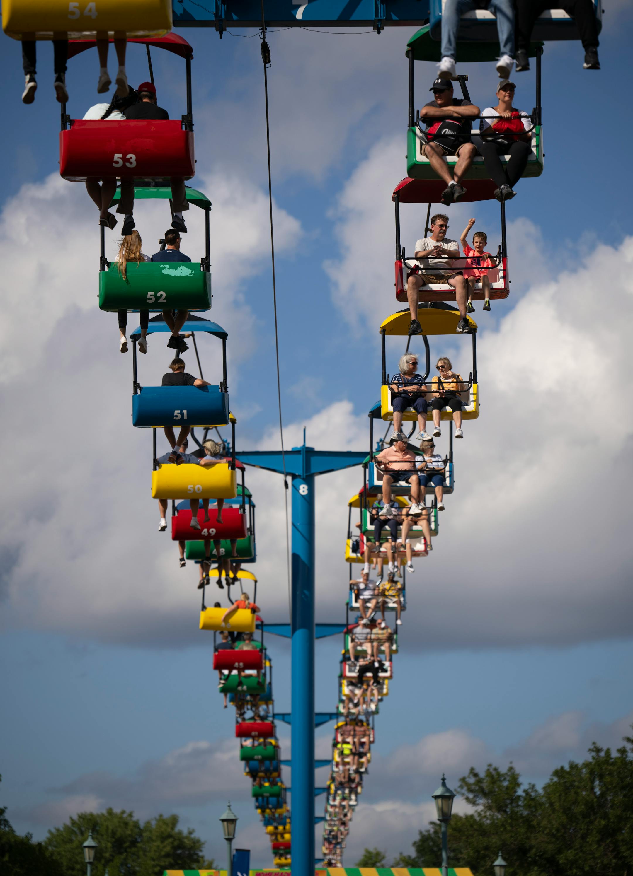 The SkyGlider was full of passengers coming and going on the first day of the Minnesota State Fair.