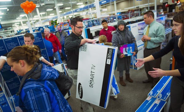 At the Ridgedale Best Buy in Minnetonka, sales were brisk, especially for tv sets when the doors opened for Black Friday .]Richard Tsong-Taatarii/rtso