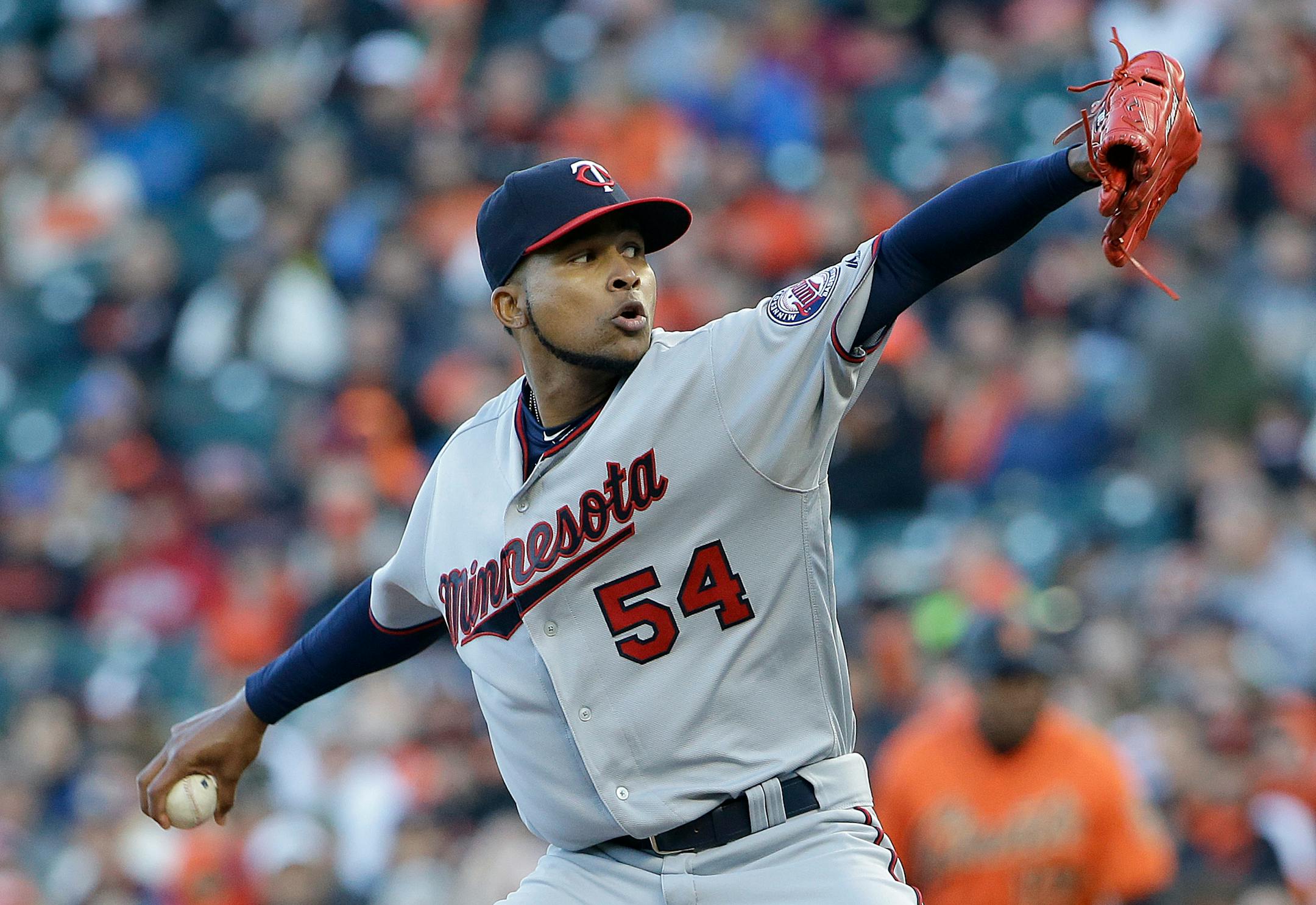 Minnesota Twins pitcher Ervin Santana (54) throws against the San Francisco Giants during the first inning of a baseball game in San Francisco, Friday, June 9, 2017. (AP Photo/Jeff Chiu)
