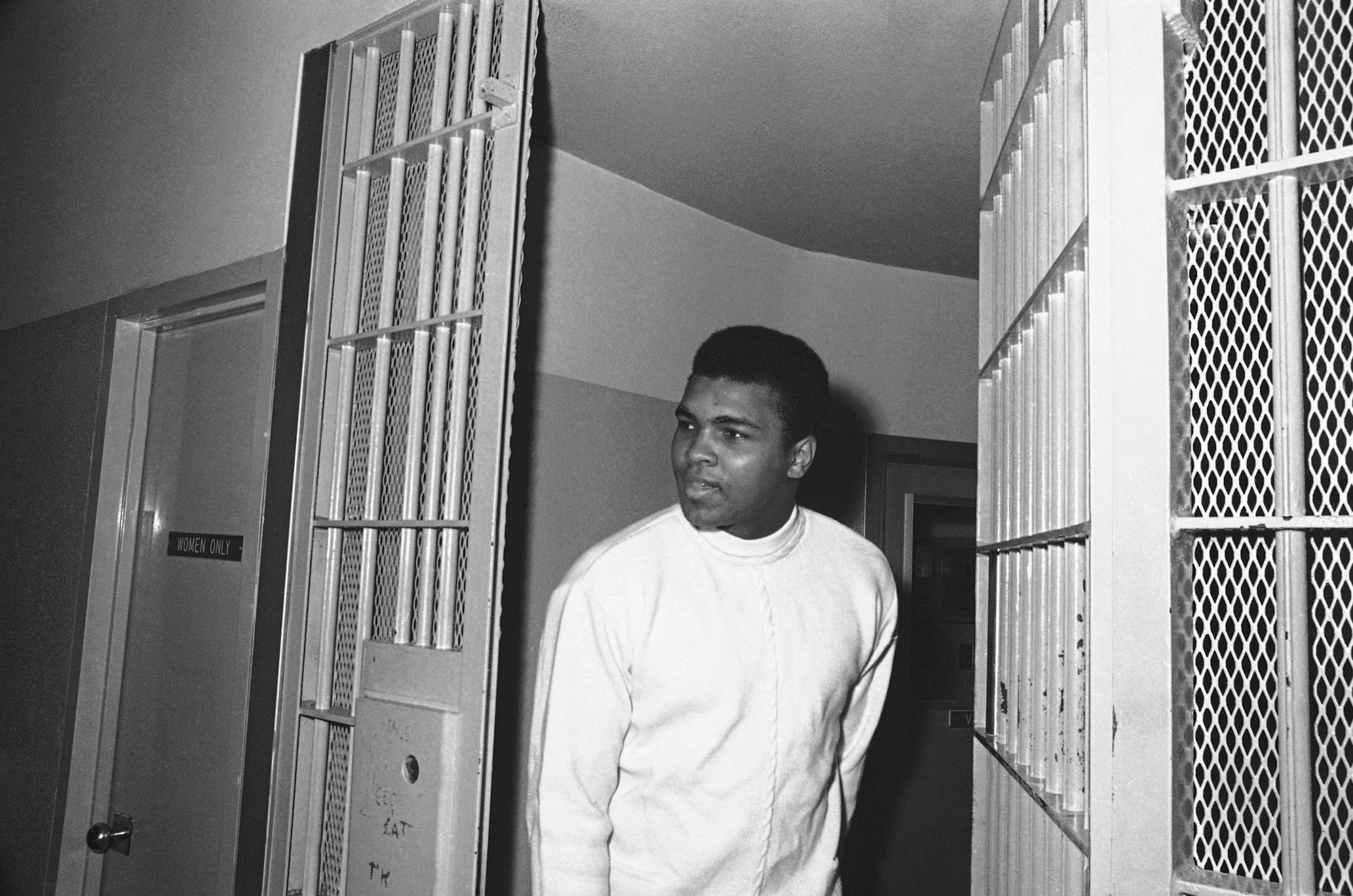 Former heavyweight boxing champion Muhammad Ali was released from Dade County jail in Miami, Dec. 23, 1968. Ali served 8 days of a 10-day sentence on a 1967 traffic charge. He was among 50 prisoners released early on Christmas amnesty. (AP Photo/Harold Valentine) ORG XMIT: APHS279888