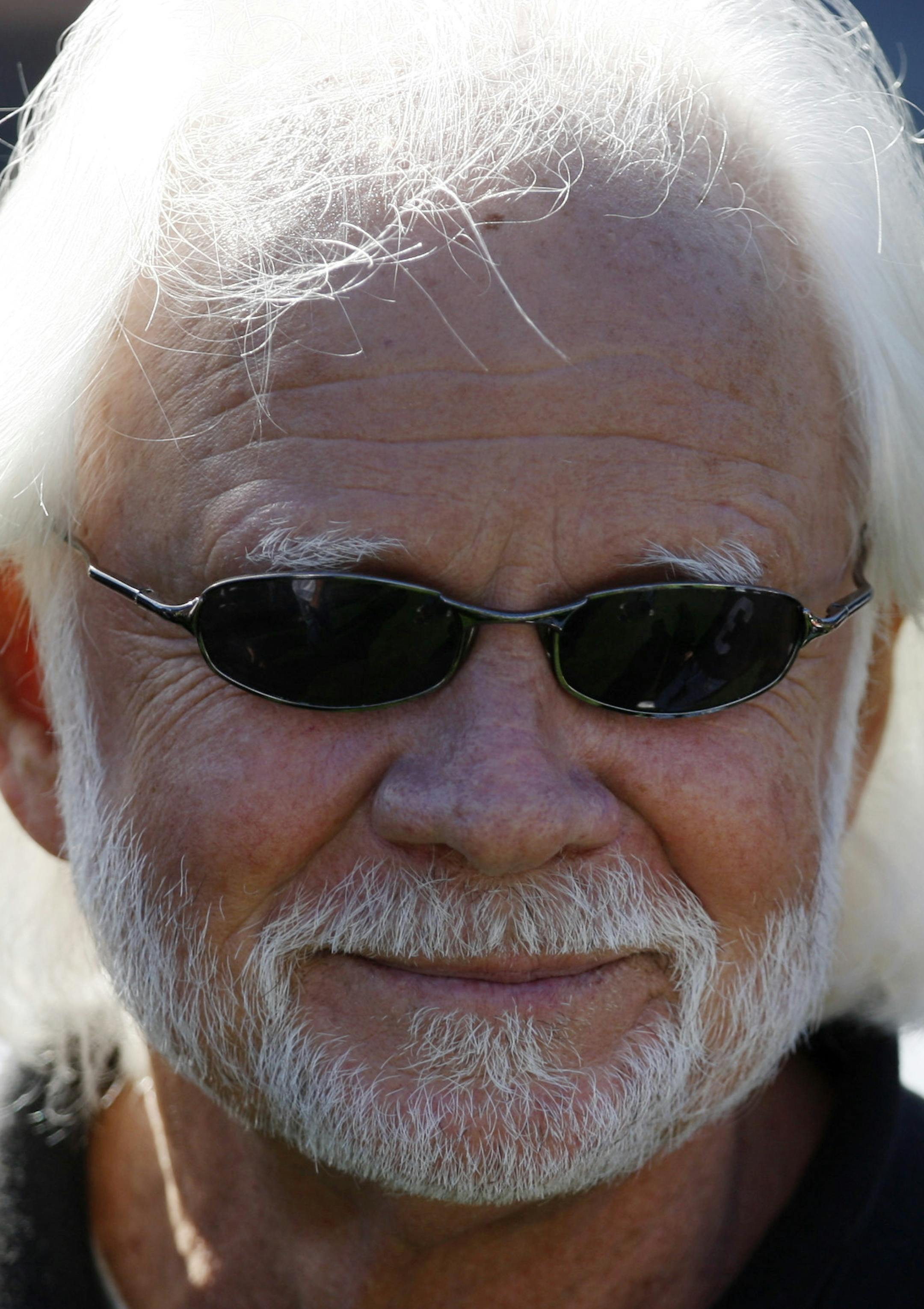 FILE - In this Oct. 25, 2009, file photo, former Oakland Raiders quarteback Ken Stabler watches during pregame of an NFL game between the New York Jets and the Raiders in Oakland, Calif. Stabler, the late NFL MVP and Super Bowl winner who is a finalist for the Pro Football Hall of Fame, has been diagnosed with the brain disease CTE, Boston University researchers say. (AP Photo/Ben Margot, File)