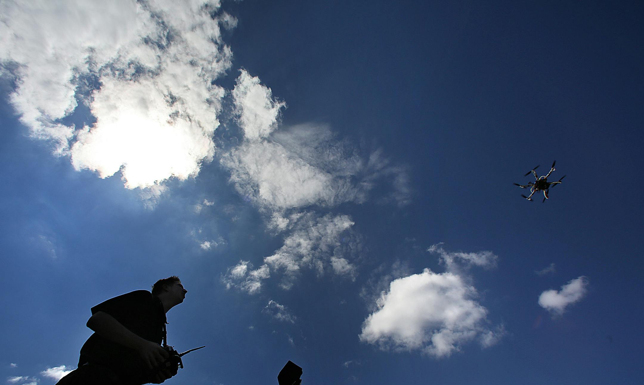 Realtor Brandon Doyle demonstrated a drone (DJI F550 with Zenmue Gimbal & Video Downlink) equipped with a small, HD camera that he uses to photograph real estate listings. ] JIM GEHRZ ‚Ä¢ jgehrz@startribune.com / Maple Grove, MN / April 8, 2014 / 1:00 PM / BACKGROUND INFORMATION: A growing number of real estate agents are marketing their listings with aerial photos taken by drones, which are being used to take high-in-the-sky photos of houses and land. Some are doing vertigo-ind