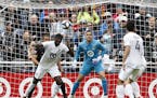 Loons player Ike Opara(3) helps out goalie Vito Mannone(1) on a goal attempt .] The Loons take on D.C. United at Allianz Field in St. Paul, MN. RICHAR