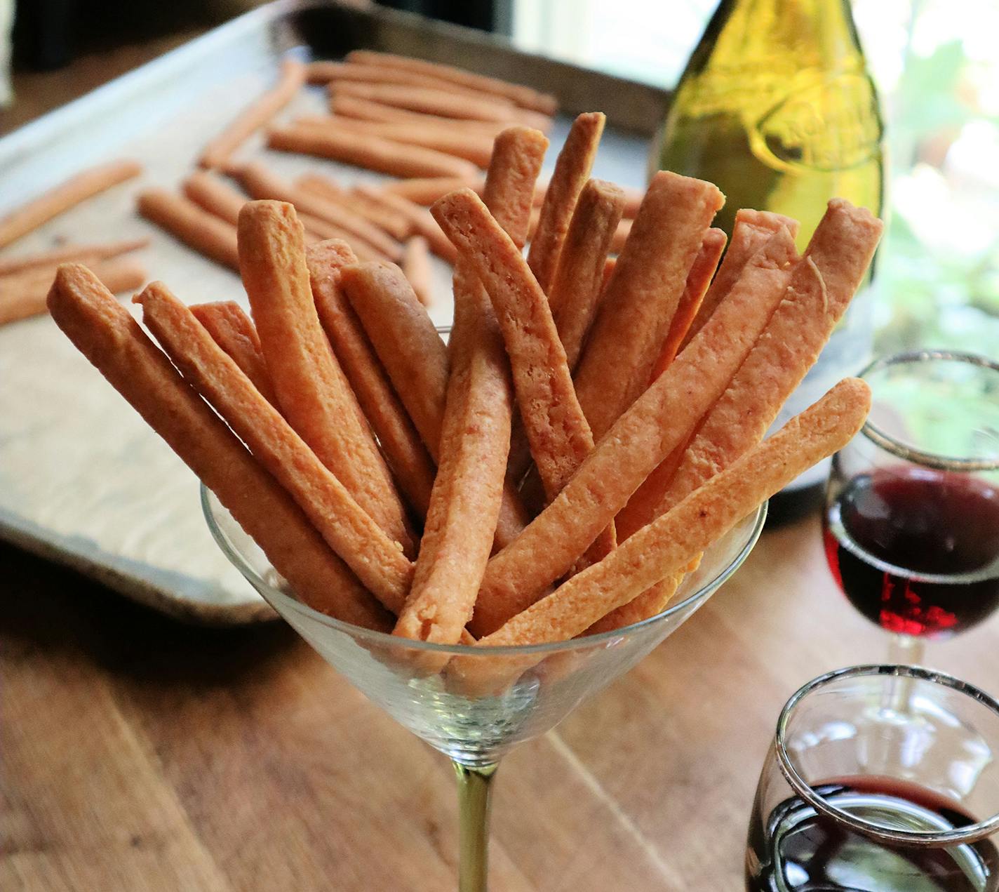 Rich and savory cheese straws pair perfectly with a glass of red or white wine. (Gretchen McKay/Pittsburgh Post-Gazette/TNS)