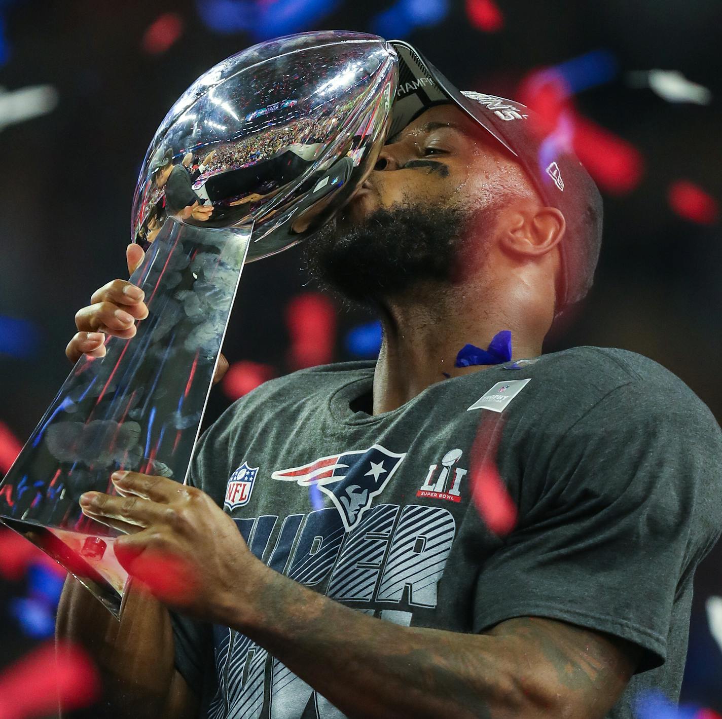 New England Patriots' James White,celebrates with the Vince Lombardi Trophy after the NFL Super Bowl 51 football game against the Atlanta Falcons Sunday, Feb. 5, 2017, in Houston.. (Tom DiPace via AP) ORG XMIT: NYWWP